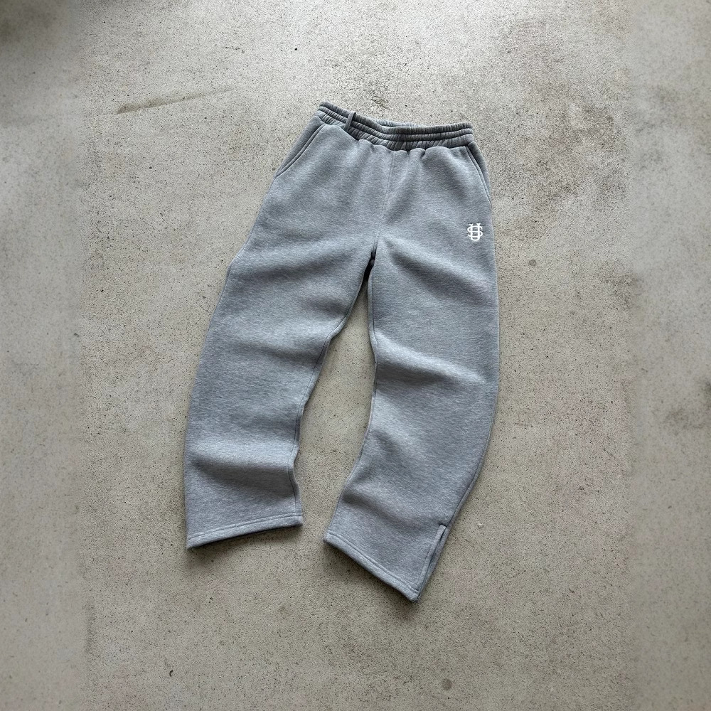 Pantalón de chándal con cremallera de color liso