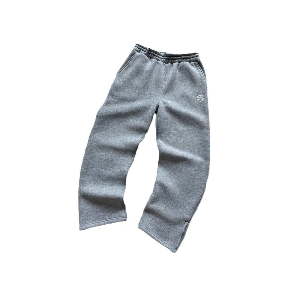 Pantalón de chándal con cremallera de color liso