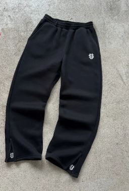 Pantalón de chándal con cremallera de color liso
